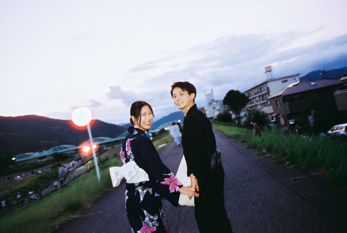 A couple under the fireworks in Japan