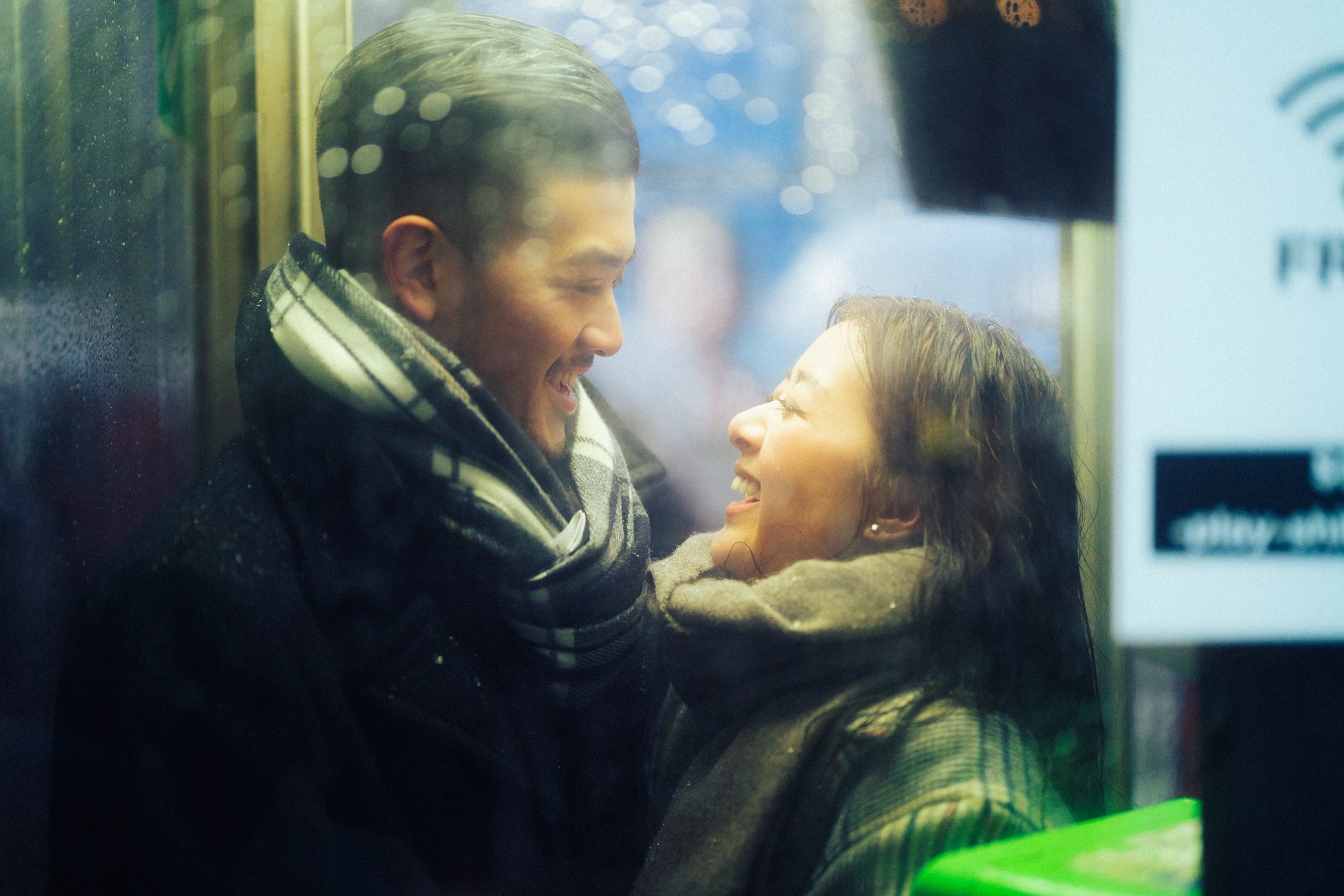 Warm window light on the two of them